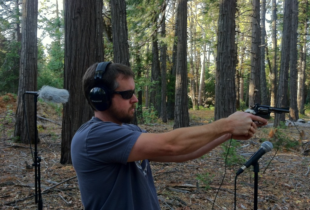 Here is Adam shooting a 38. If you look closely you can see the tape holding the lav onto the gun. 
